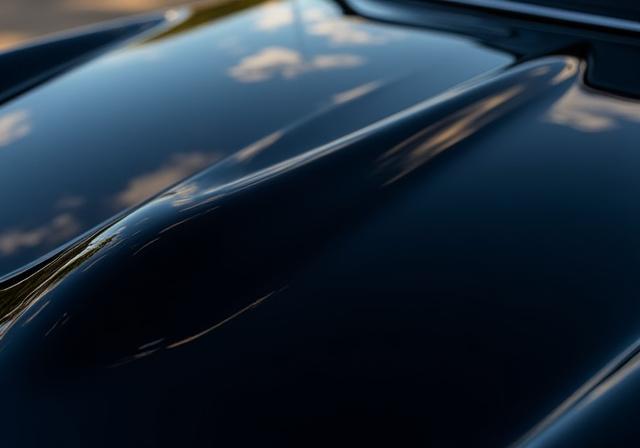 The same car paint with a perfect, mirror-like reflection. 640x448